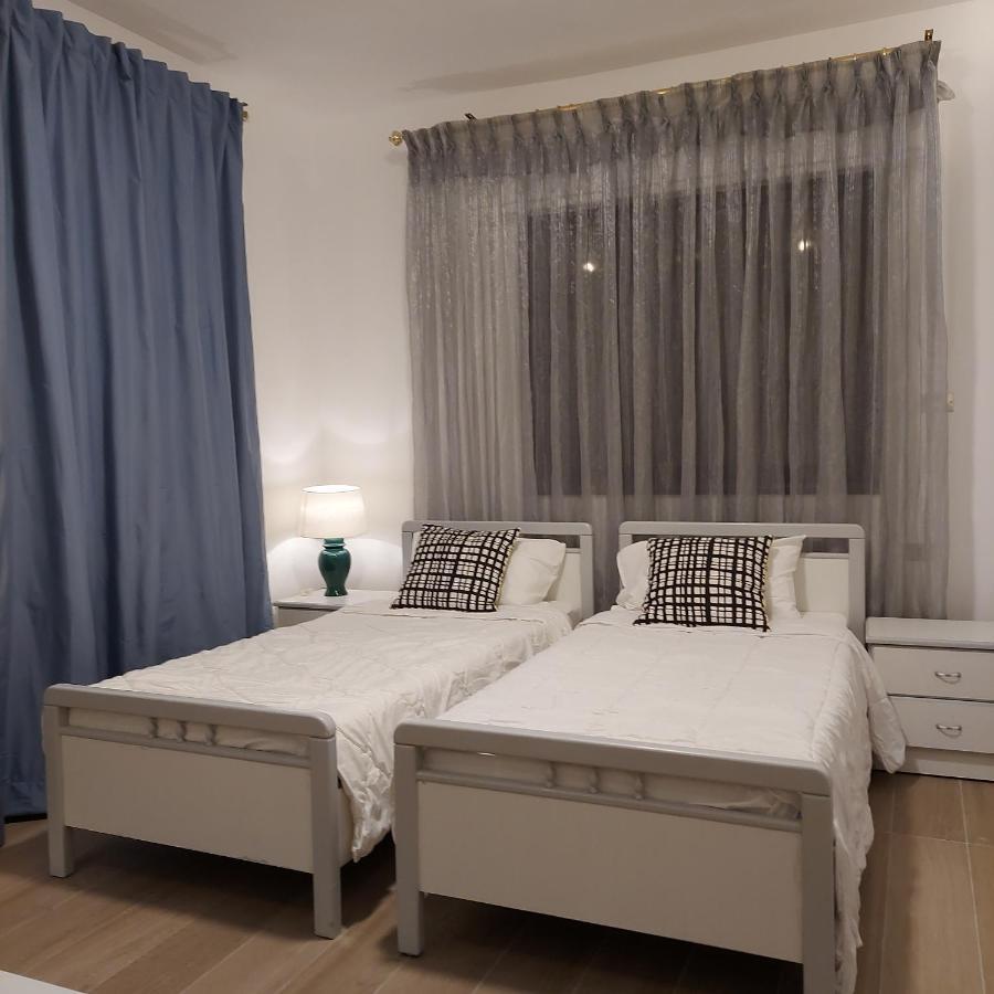 Coco Guesthouse Мадаба Екстериор снимка